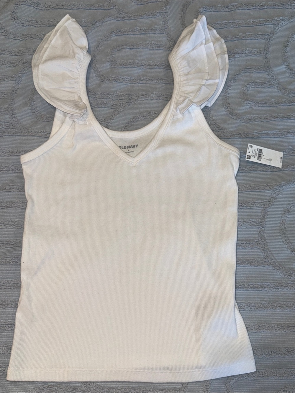 NWT white ribbed tank top with ruffles on shoulder